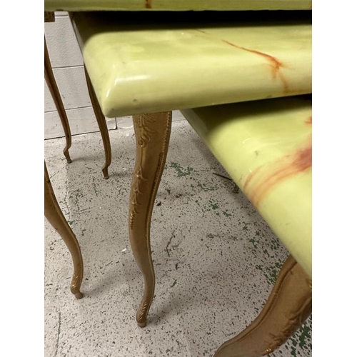 104 - A nest of three faux marble side table (H48cm W60cm D45cm)