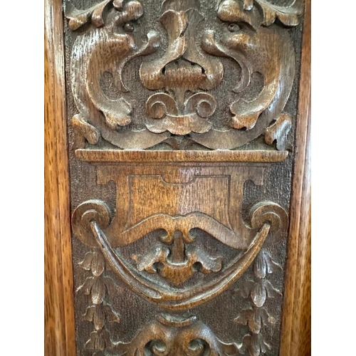 111 - A Victorian oak wardrobe with walnut inlay, mirrored door and drawer under by Blyh and Sons of Londo... 