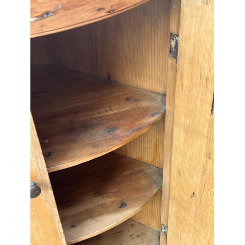 114 - A pine corner cabinet (H81cm W54cm D35cm)