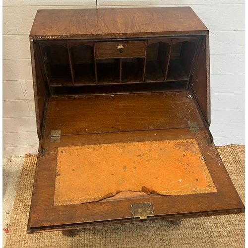 118 - A reproduction bureau on cabriole legs (H107cm W61cm D42cm)