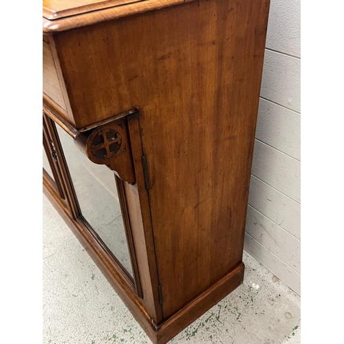 51 - A chiffonier with glazed doors and galleried back (H117cm W112cm D46cm)