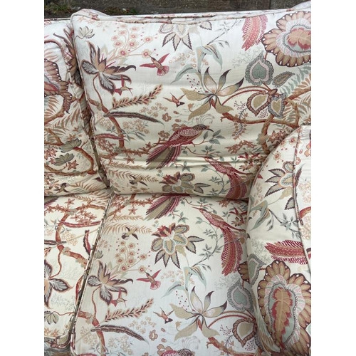 72 - Two seater sofa with loose covers