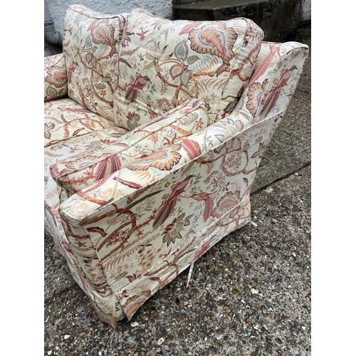 72 - Two seater sofa with loose covers