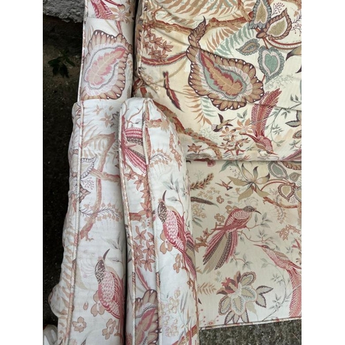 73 - Two seater sofa with loose covers