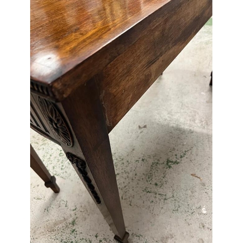 88 - A mahogany serpentine serving table/console on tapering legs (H84cm W137cm D54cm)