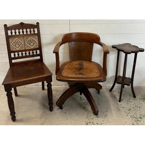 91 - A 1930's oak swivel office chair along with an oak tile back hall chair and a plant stand