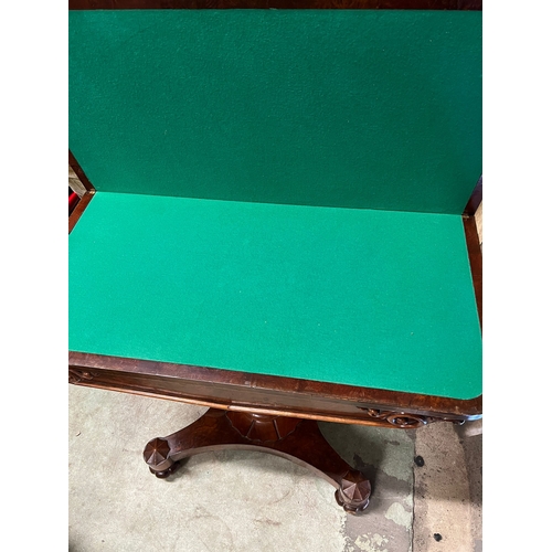 110 - William IV style mahogany game table on shaped base and roundels to each corner (H76cm W89cm D44cm)