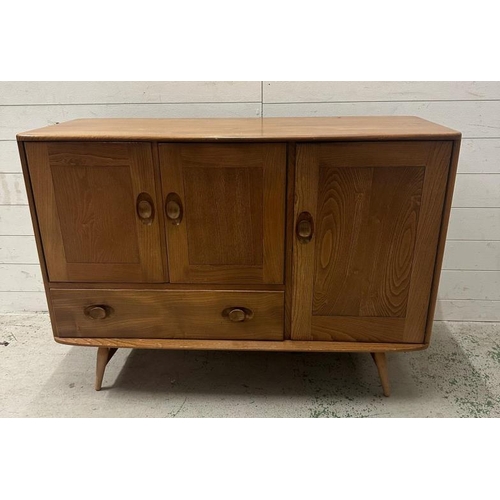 181 - An Ercol mid-century sideboard with two cupboards and one long drawer H82114 X 48