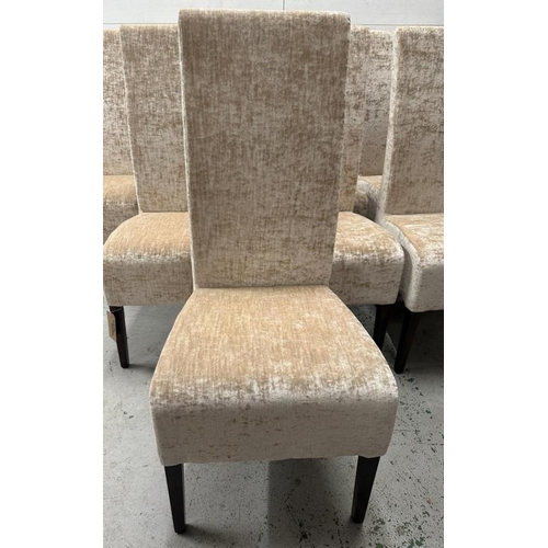 185 - A set of eight crushed velvet dining chairs in a champagne upholstery
