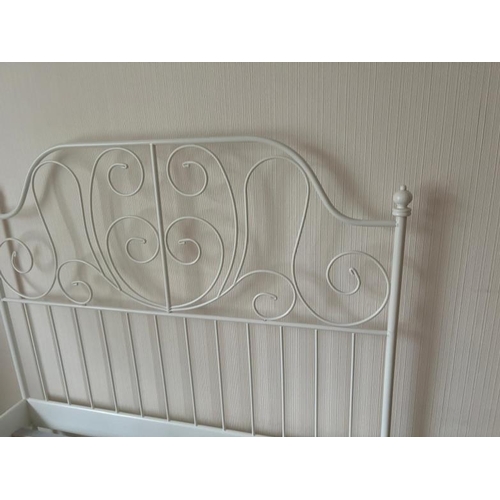 188 - An Ikea double bed frame in white (206cm x 144cm)