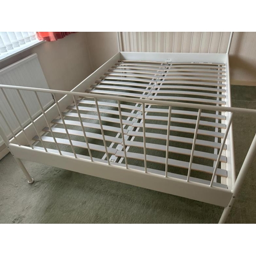 188 - An Ikea double bed frame in white (206cm x 144cm)