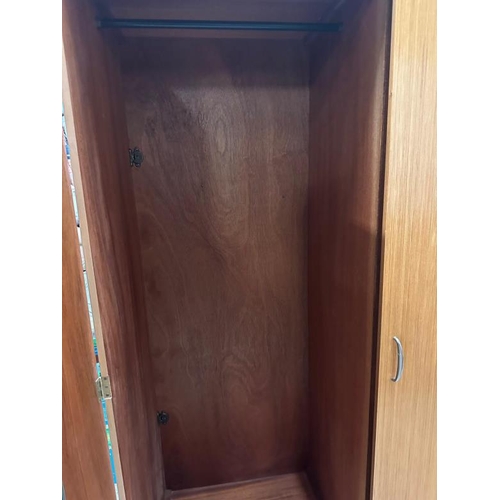 190 - A Stag wardrobe with cross hanging and five interior shelves (H178cm W92cm D56cm)