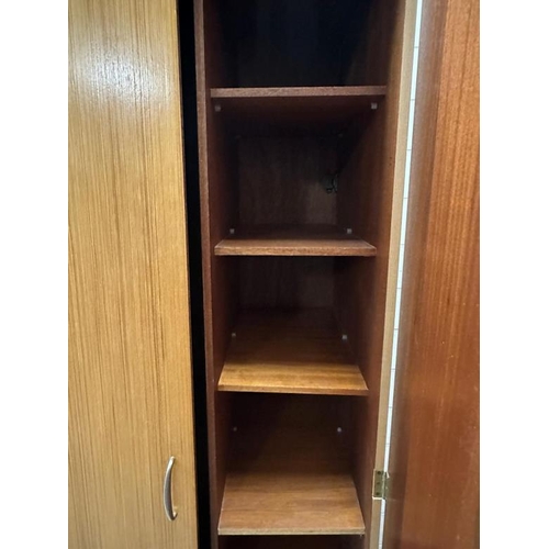 190 - A Stag wardrobe with cross hanging and five interior shelves (H178cm W92cm D56cm)