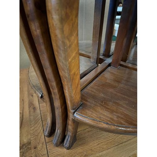 195 - A circular side table with four nesting tables under (H52cm Dia58cm)