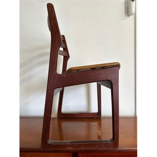 196 - An Elliot's of Newbury metamorphic dining set comprising of table, sideboard and four chairs