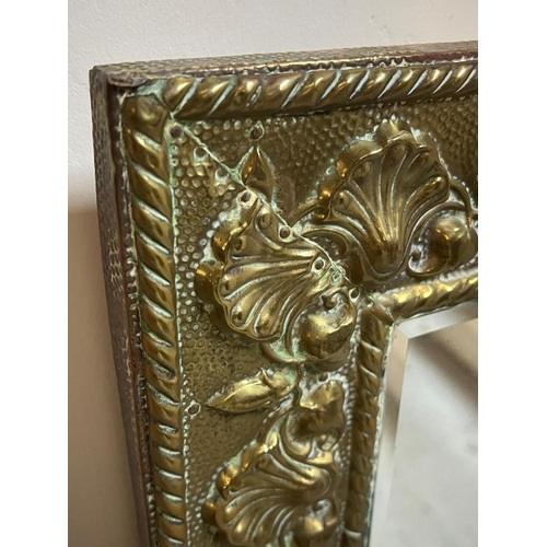 198 - Heavy Embossed brass framed mirror, 56cm X 44cm