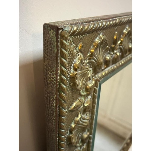 198 - Heavy Embossed brass framed mirror, 56cm X 44cm