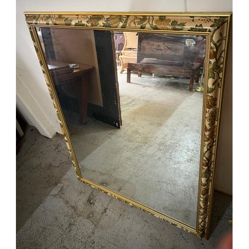 199 - A large wall mirror with floral theme frame, 132cm x 104cm