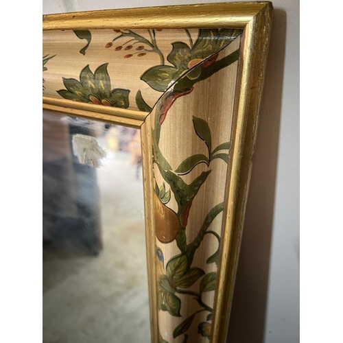 199 - A large wall mirror with floral theme frame, 132cm x 104cm