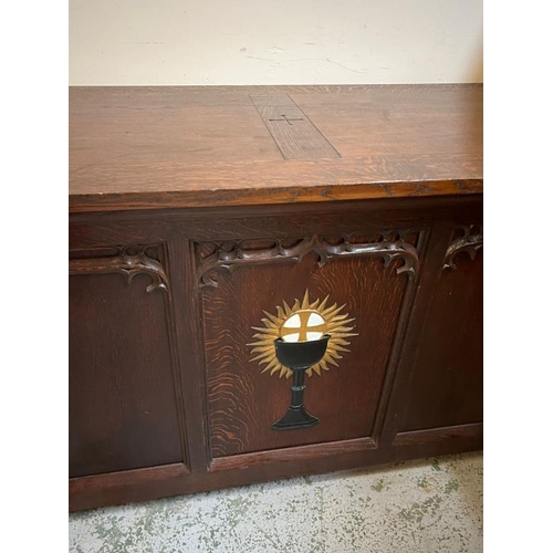 2 - A carved oak church altar table, three panels to front and carved inlay of chalice with cross, L183 ... 