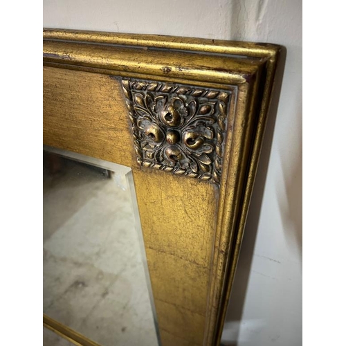 200 - Gilt wall mirror with floral design to corners, H115 X 84cm