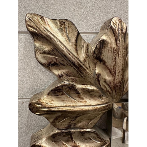 205 - A bevel edged hall mirror with foliate frame