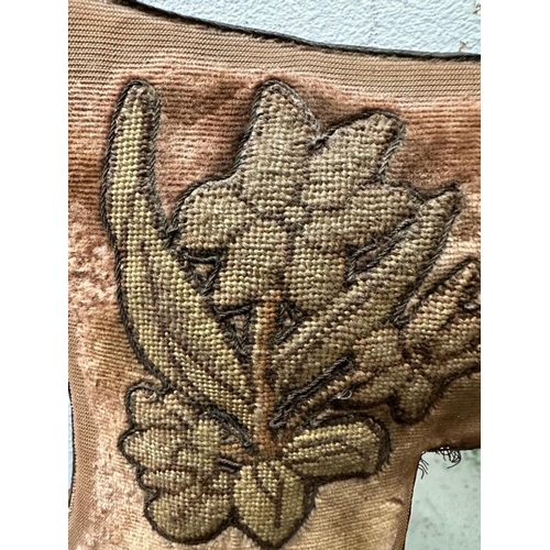 209 - An Arts and Crafts style mirror in an embroidered cushion frame featuring deer and trees 57cm x 72cm