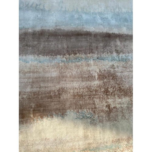 210 - A Rochebobois of Paris hand woven rug in clay, blues and greys. 200x300 cm