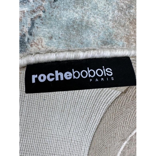 210 - A Rochebobois of Paris hand woven rug in clay, blues and greys. 200x300 cm