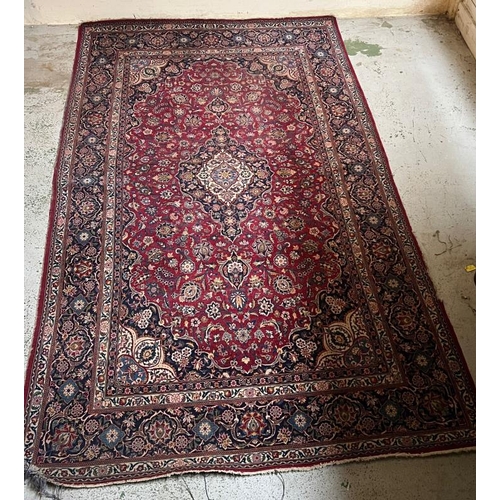 212 - Large Persion style rug with central medallion and four scrolling corners 138cm X 233cm