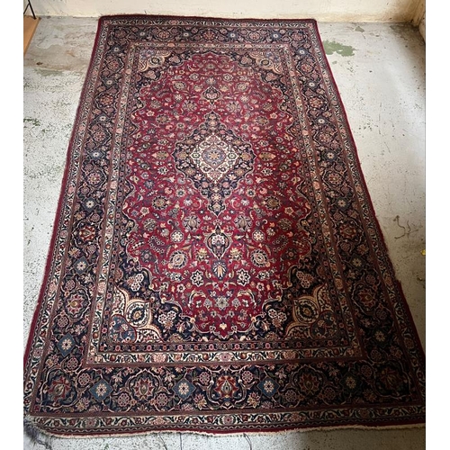 212 - Large Persion style rug with central medallion and four scrolling corners 138cm X 233cm