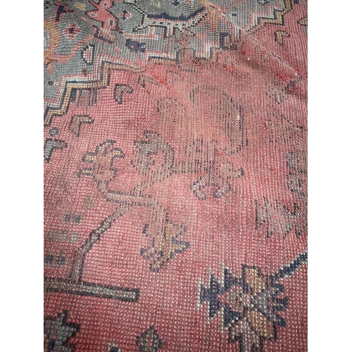 214 - Large rug with centre medallion, blue and red grounds, 157 X 160 cm AF