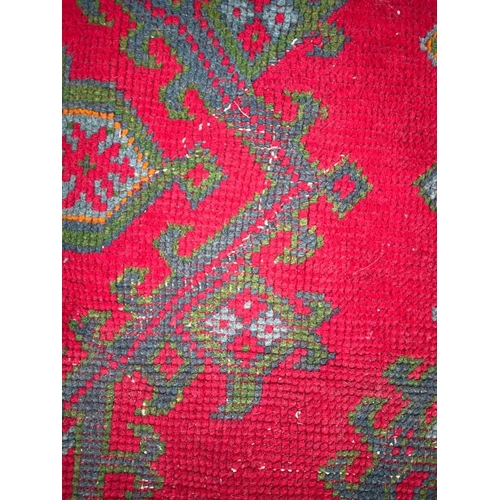 215 - Large red rug with geometric design, 147 X 121cm AF