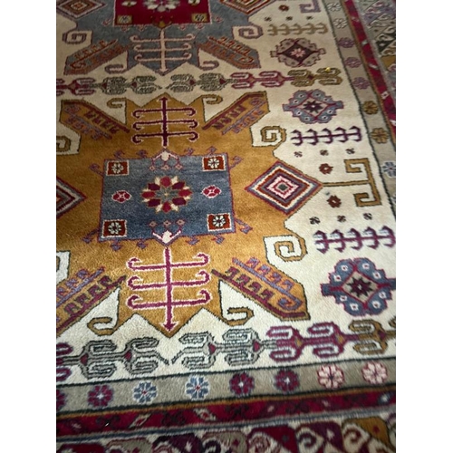 216 - Turkish style woven rug, 248 X 152 cm