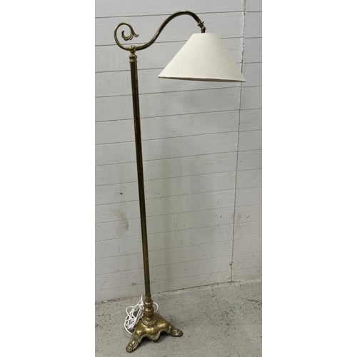 219 - An Art Deco brass floor standing lamp