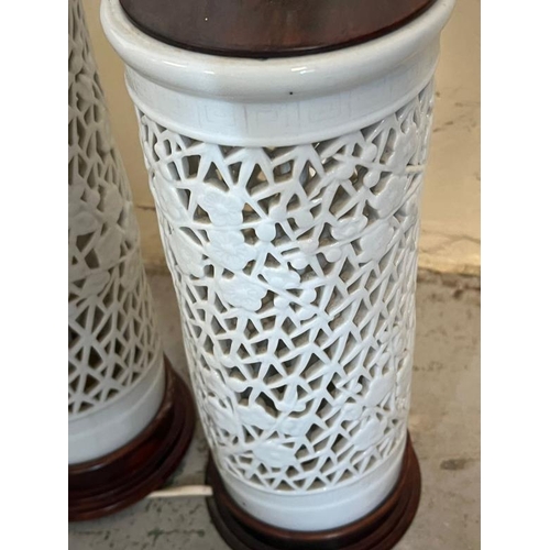 225 - A pair of oriental style white pierced Lamps