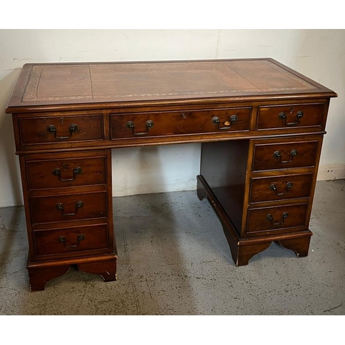 41 - Pedestal desk with leather inlaid top and drop handles, H78 X D60 X W124cm