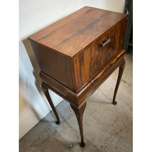 44 - Metamorphic Cocktail cabinet on out swept legs, W54 X D37 X H100cm