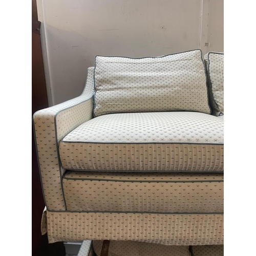 45 - Two, two seater sofa's in cream and blue piping (H66cm W153cm D86cm)