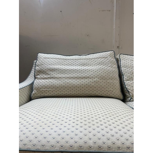 45 - Two, two seater sofa's in cream and blue piping (H66cm W153cm D86cm)
