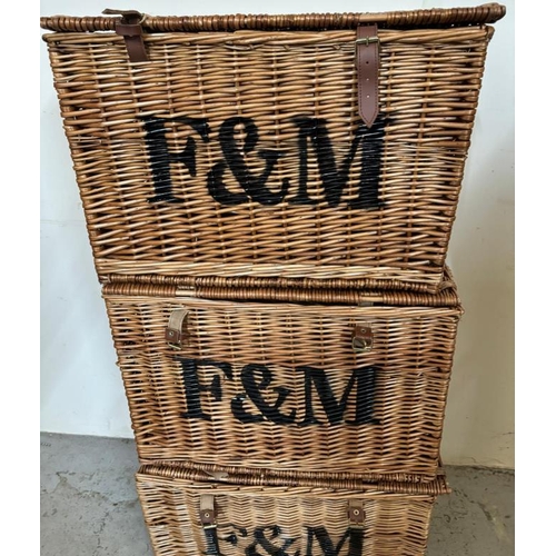 49 - Three F and M wicker baskets (H40cm W60cm D40cm)