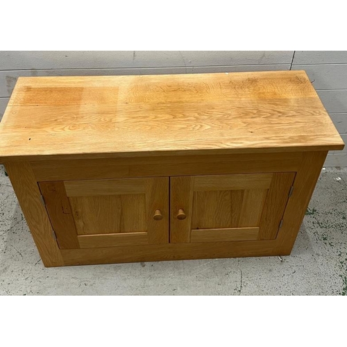 53 - An oak sideboard or hall storage unit (H64cm W108cm D42cm)