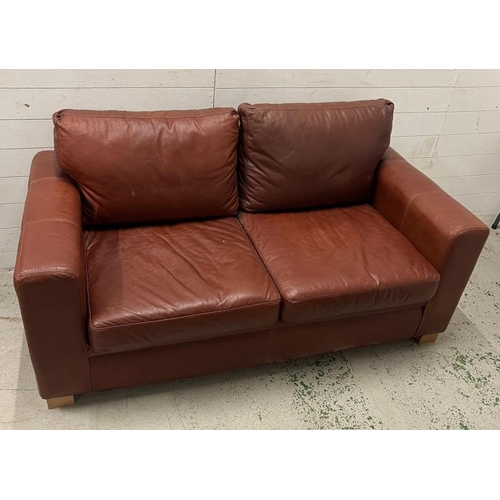 10 - Two seater leather sofa bed (H73cm W166cm D86cm)