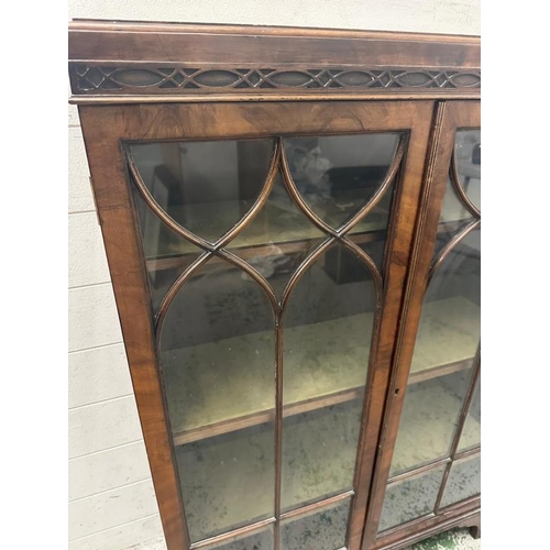 103 - A mahogany astragal glazed display cabinet with three shelves (H110cm W76cm D26cm)