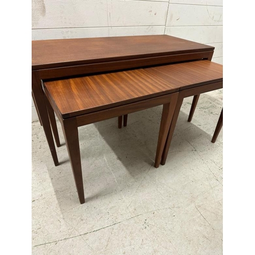 108 - A nest of three Mid Century tables