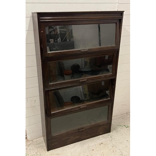 111 - A glazed legal or barrister bookcase, up and over glazed doors with wooden bar handles (H154cm W89cm... 