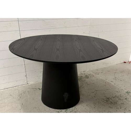 112 - A circular black dining table by Zeitraum. Diameter 120 cm Height 75 cm