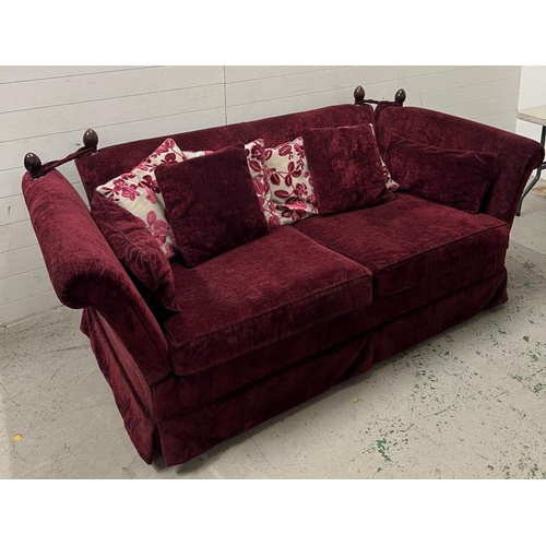 12 - A deep red velvet sofa with drop sides (H79cm W220cm D108cm)