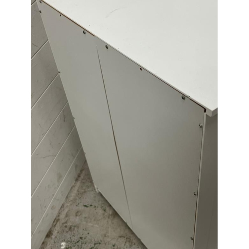 30 - A white side cabinet with four drawers and side cupboard (H82cm W55cm D30cm)