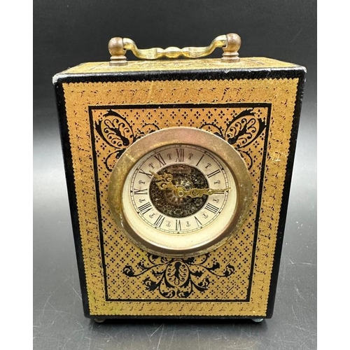 A Mercedes carriage clock, 22ct gold embossed marked Design Philipp